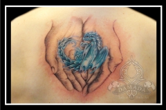 Dragon on hands